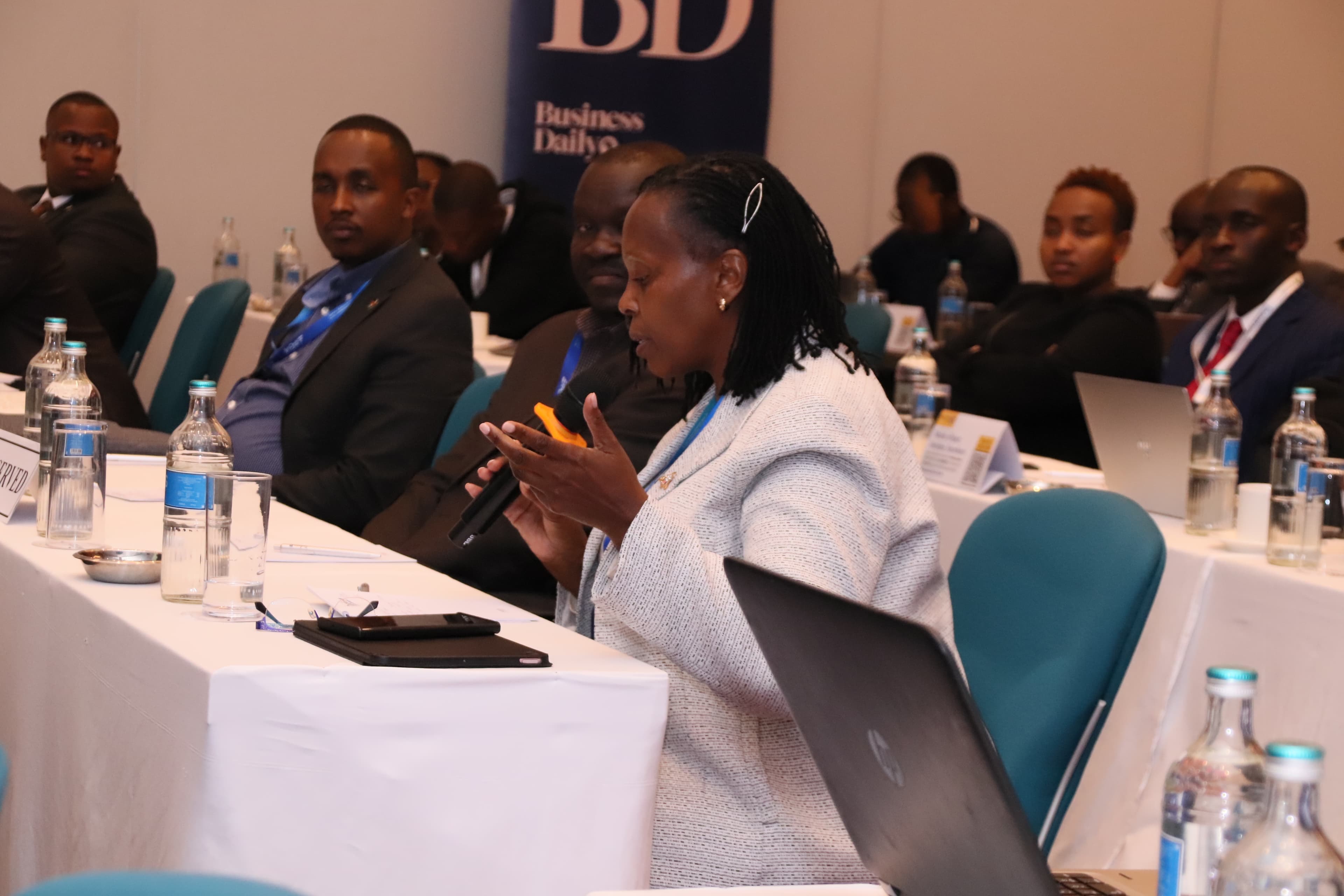 Conference speaker taking audience questions in a Q&A session